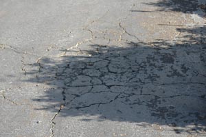 Spiderweb asphalt driveway cracks